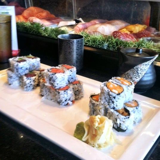 Photo taken at Yoshi Sushi by Phil T. on 3/13/2012