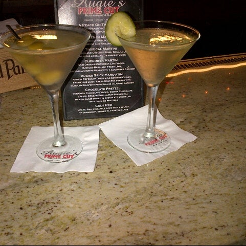Photo taken at Augie&#39;s Prime Cut Restaurant &amp; Bar by Kathryn C. on 8/3/2012
