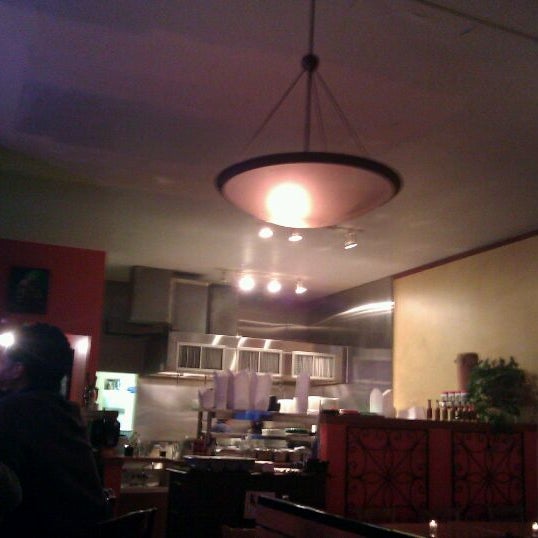 Photo taken at Island Soul Caribbean Bar and Cuisine by Rand F. on 4/27/2012
