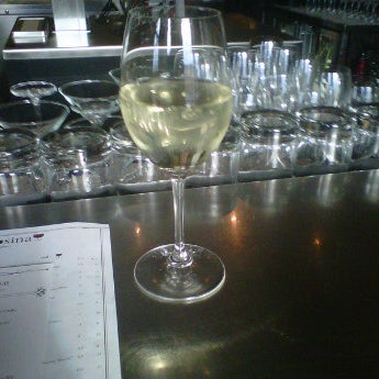 Photo taken at Vino Rosina Wine Bar by Gina G. on 3/19/2012