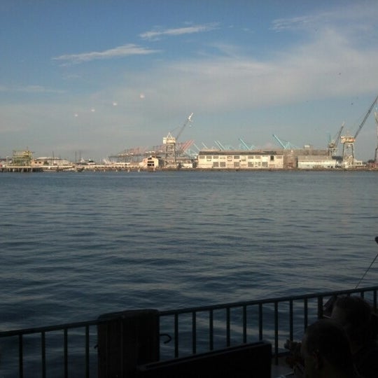 Photo taken at Ports O&#39; Call Waterfront Dining Restaurant by Andrew M. on 8/13/2012