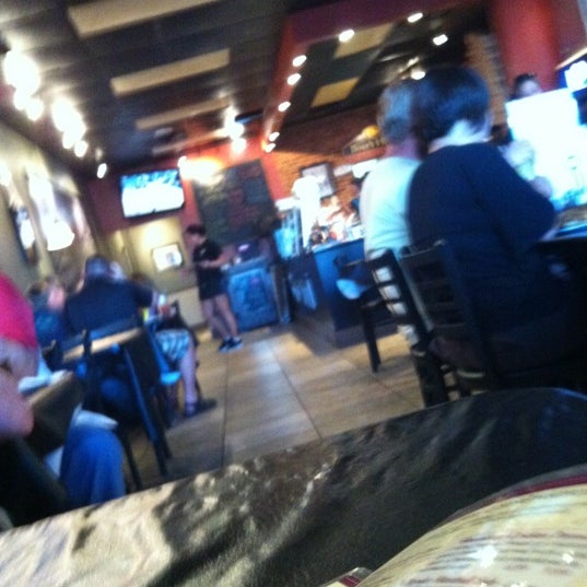 Photo taken at Brozinni Pizzeria by Parker S. on 3/16/2012
