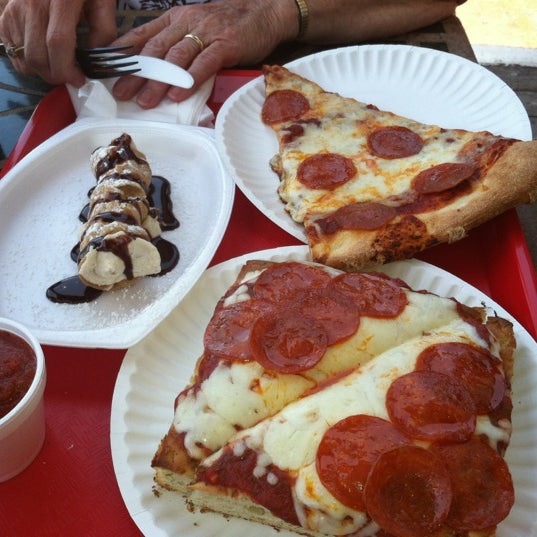 Photo taken at Asaggio Pizza Pasta Plus by Leila H. on 5/16/2012