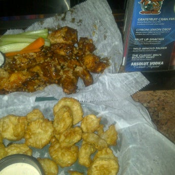 Their Grilled triple threat wings w minced garlic & fried pickles are the best EVER! Every year taste better & better and their cocktails are awesome! Thanks for my free beer 4sq :)