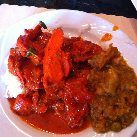 Photo taken at New Delhi Indian Restaurant by Heather S. on 4/29/2012