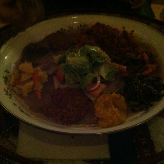 Photo taken at Abyssinia Ethiopian Restaurant by Jude T. on 3/8/2012