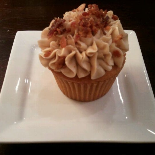 Photo taken at The Yellow Leaf Cupcake Co by Beth B. on 3/1/2012