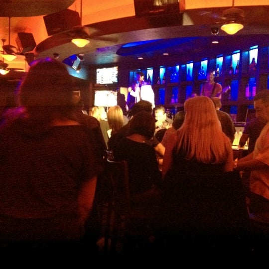 Photo taken at Blue Martini Lounge by Kristin G. on 3/10/2012