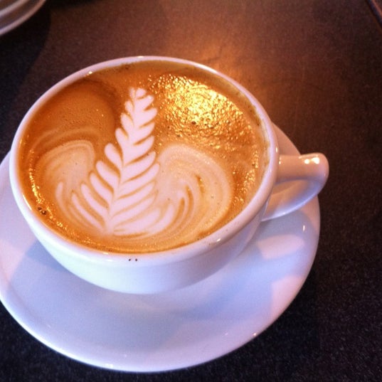 Photo taken at Volta Coffee, Tea &amp; Chocolate by Nikhil K. on 7/20/2012