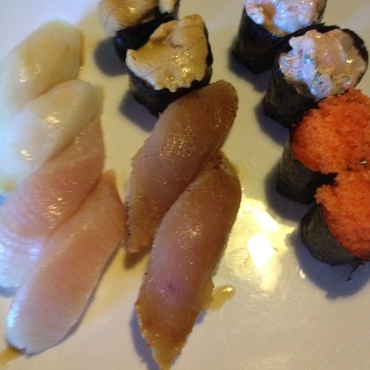 Photo taken at Sushi Delight by Tim C. on 7/3/2012