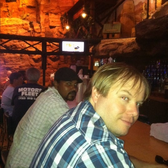 Foto tirada no(a) Jim Beam&#39;s Wild West Bar por Ryan O. em 5/24/2012