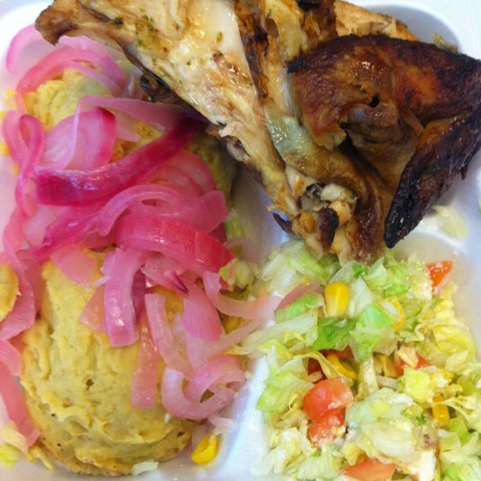 Photo taken at Mangu Dominican Kitchen by JoAn S. on 8/24/2012
