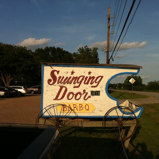 Photo taken at The Swinging Door by John L. on 8/5/2012