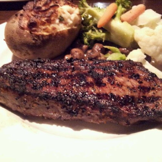 Photo taken at The Keg Steakhouse + Bar - Richmond South by Catherine C. on 5/14/2012