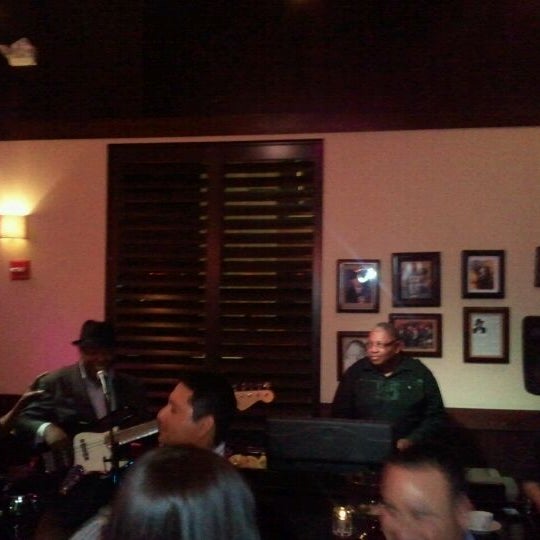 Photo taken at Vines Grille &amp; Wine Bar by Antony L. on 4/21/2012