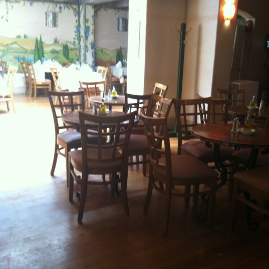 Photo taken at Osteria d&#39;Assisi by Carie K. on 5/31/2012