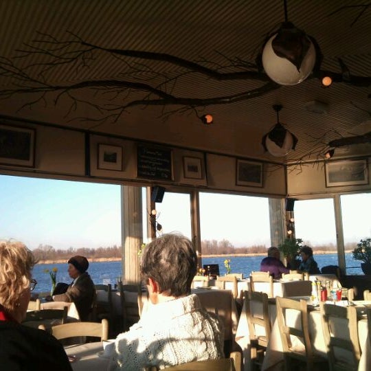 Photo taken at Het Panorama Restaurant/Grand-Café by Chrissy M. on 2/2/2012