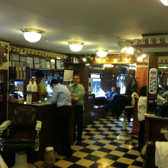 Photo taken at Paul Mole Barber Shop by Arik H. on 4/13/2012