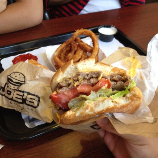 Photo taken at Joe&#39;s Burgers by Martin F. on 7/2/2012