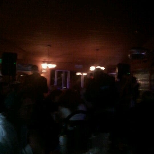 Photo taken at The Lower Tavern by Sara L. on 6/23/2012