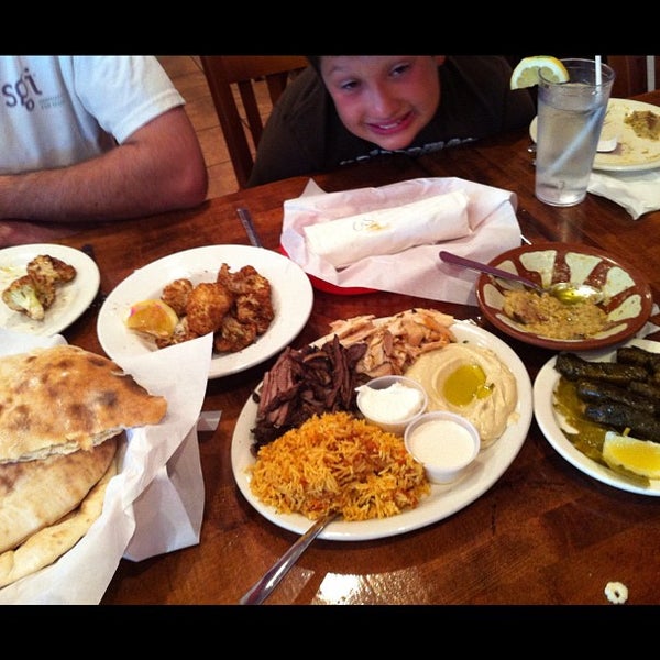 Photo taken at Afrah Mediterranean Restaurant &amp; Pastries by Mandi W. on 6/16/2012