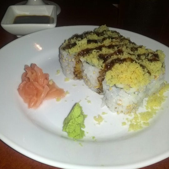 Photo taken at Sushi Rock by Rohan A. on 7/27/2012