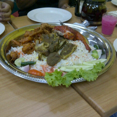 Photo taken at Al Raudah Arabian Food by Melissa F. on 7/28/2012