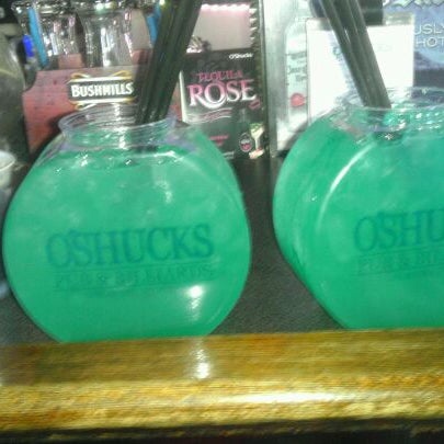 Photo taken at O&#39;Shucks Pub &amp; Karaoke Bar by Heather H. on 2/13/2012