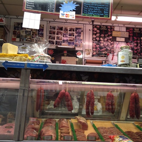 Photo taken at Graham Avenue Meats and Deli by Matt on 3/23/2012