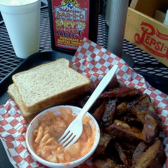 Photo taken at Dick&#39;s Bodacious BBQ by David Allen on 6/27/2012