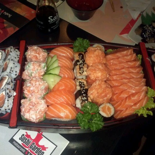 Photo taken at Sushi Garden by Sandra M. on 3/29/2012