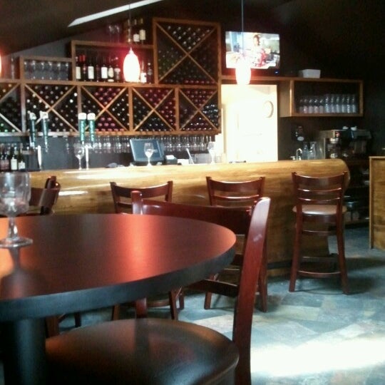 Photo taken at Napa Wood Fired Pizzeria by Anne M. on 6/8/2012