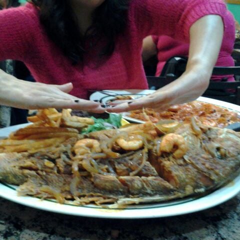 Try the fried huachinango (red snapper) in the nayarit style.  Delish but beware.  It is a huge fish!