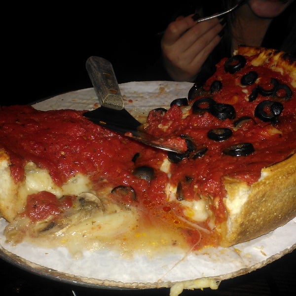 Photo taken at Patxi&#39;s Pizza by Anthony L. on 4/15/2012