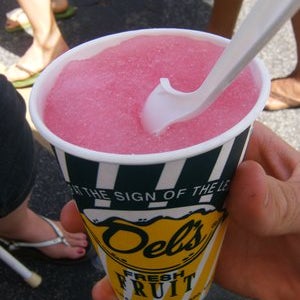 Grab a cup of Del's Lemonade... All natural, with fresh lemon rind and smooth icee texture.