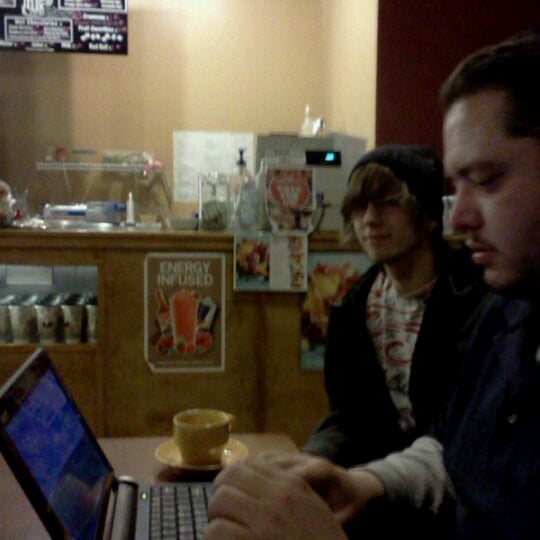 Photo taken at Short North Coffee House by Kate on 2/23/2012