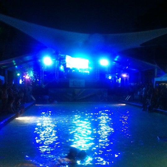 Photo taken at The Pool Parties at The Surfcomber by Scott V. on 3/25/2012