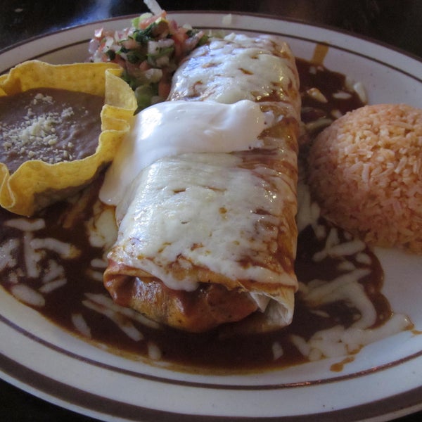 A really yummy Al Pastor burrito. Definitely be sure to order enchilada style!