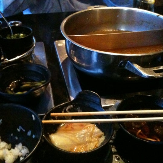 Photo taken at Yojie Japanese Fondue by Ahmed E. on 7/16/2012
