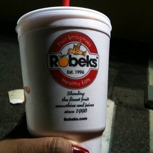Photo taken at Robeks Fresh Juices &amp; Smoothies by Jennath Nice S. on 6/16/2012