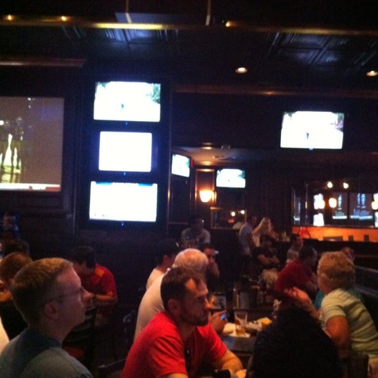 Photo taken at Christie&#39;s Sports Bar by Richard D. on 7/1/2012