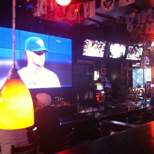 Photo taken at Hoops Sports Bar &amp; Grill- Bremner by Chelsea C. on 5/16/2012