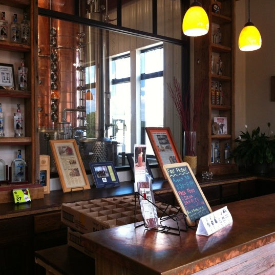 Photo taken at Mississippi River Distilling Company &amp; Cody Road Cocktail House by Kelly J. on 7/27/2012