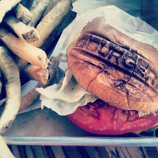 Photo taken at BurgerFi by Alexis D. on 5/14/2012
