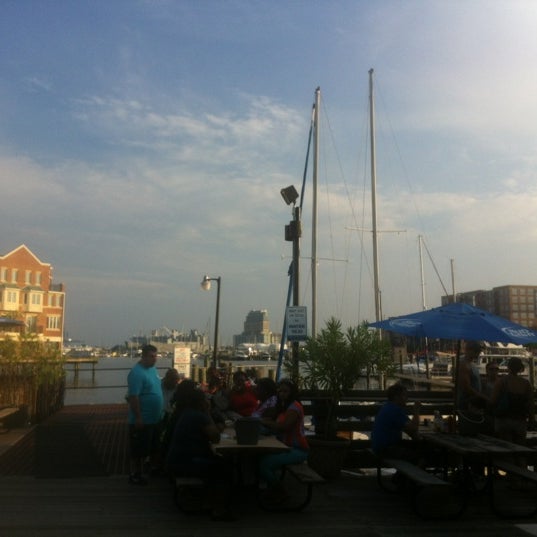 Photo taken at Captain James Landing - Restaurant and Crab House by Angela C. on 8/6/2012