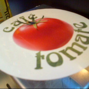 Photo taken at Café Tomate by Albert G. on 6/1/2012