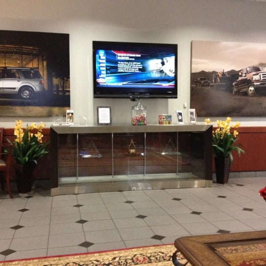 Photo taken at Planet Ford Dallas by Dan H. on 5/4/2012