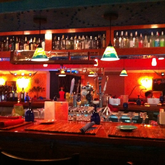 Photo taken at Ola Restaurant by Greg S. on 4/28/2012