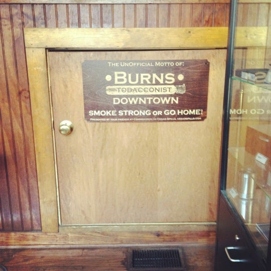 Photo taken at Burns Tobacconist Downtown by L. C. W. on 5/11/2012