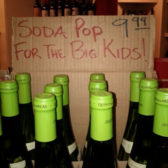 Photo taken at Sea Grape Wine Shop by Sara R. on 3/20/2012